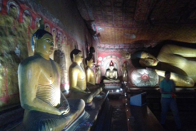 All inclusive Private Day tour Sigiriya, Dambulla & traditional village tour - Climbing through Dambulla’s Golden Temple and cave shrines