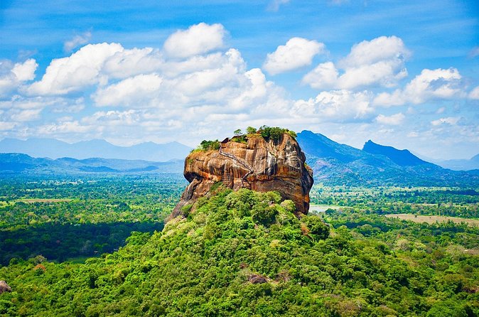 All Inclusive Sigiriya and Dambulla Day Tour from Colombo - Entering Dambullas five painted caves