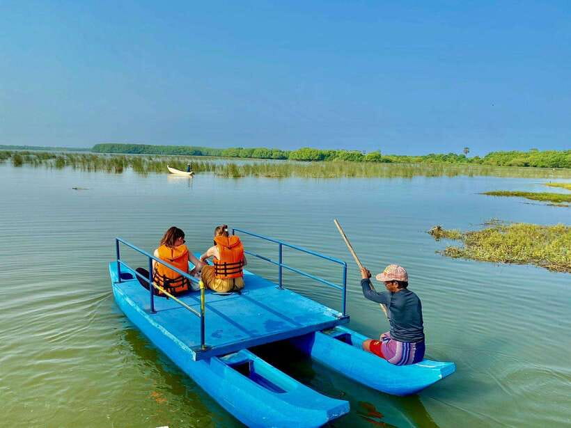 Arugambay :Pottuvil Lagoon Mangrove Eco Boat Safari Tours - A quiet morning on Pottuvil Lagoon