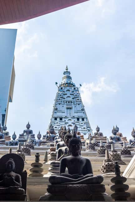 Colombo: private city tour from Negombo with hotel transfers - Gangaramaya Temple and the flower offering