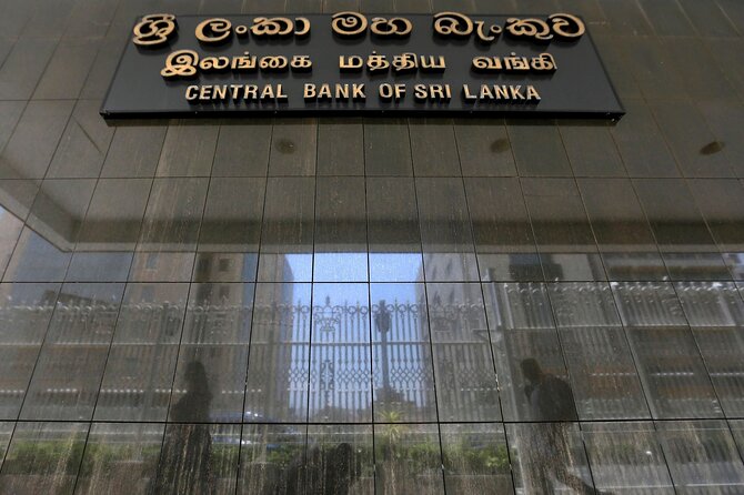 Colombo Social and Political Walk - The World Trade Center and Old Parliament show two kinds of power