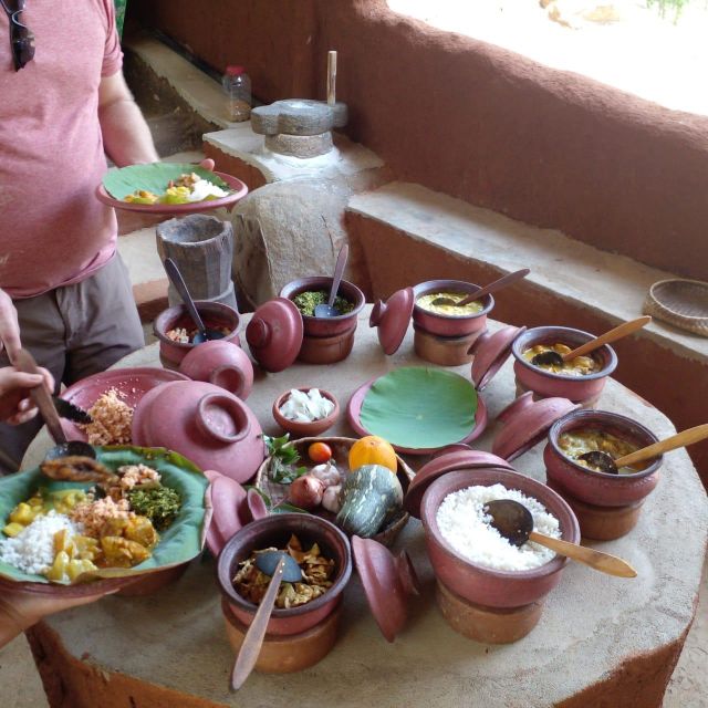 Dambulla: Caves Temple & Traditional Village Tour with Lunch - Walking through fields to the traditional house