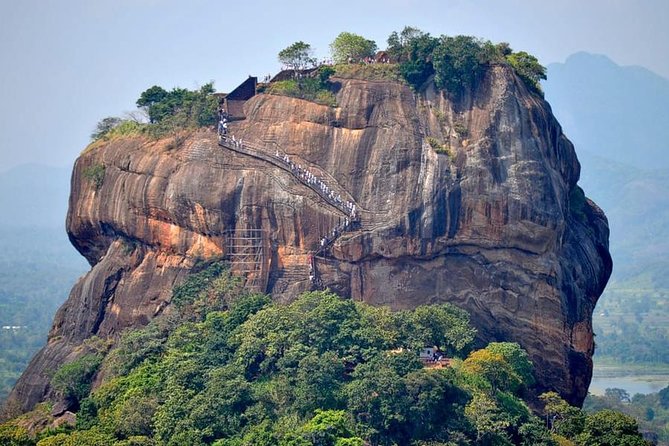 Day Trip To Sigiriya & Dambulla Temple with Free Sri Lankan Lunch - Dambulla Cave Temple and its 153 Buddha statues