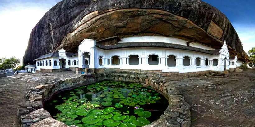 From Sigiriya: Kandy Transfer with Dambulla and Spice Garden - Entering Dambulla’s painted cave temple