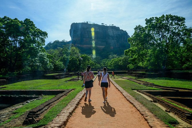 Sigiriya Rock and Dambulla Cave All Inclusive Private Day Trip - Dambulla adds art, worship, and another uphill walk